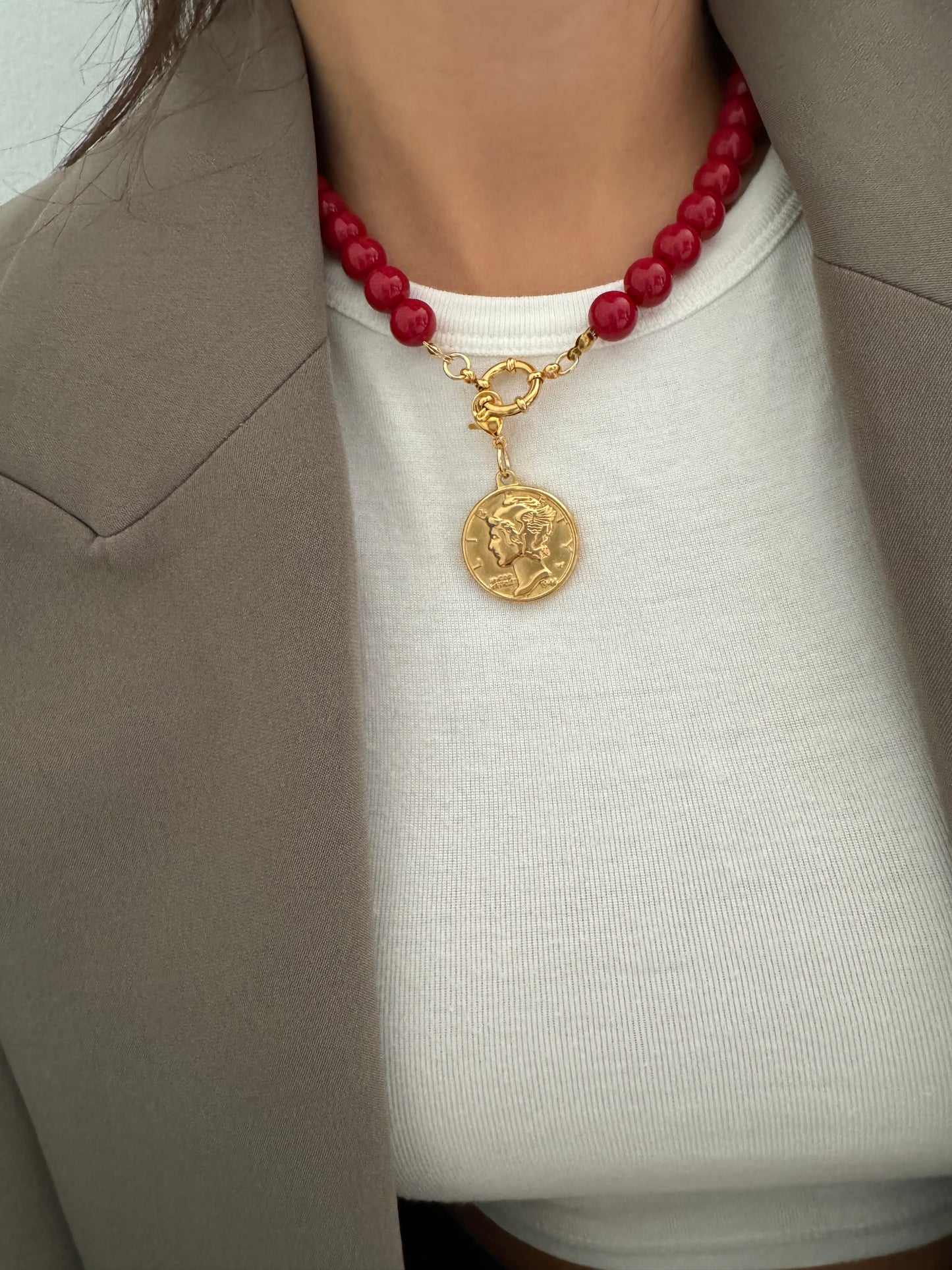Charms moneda