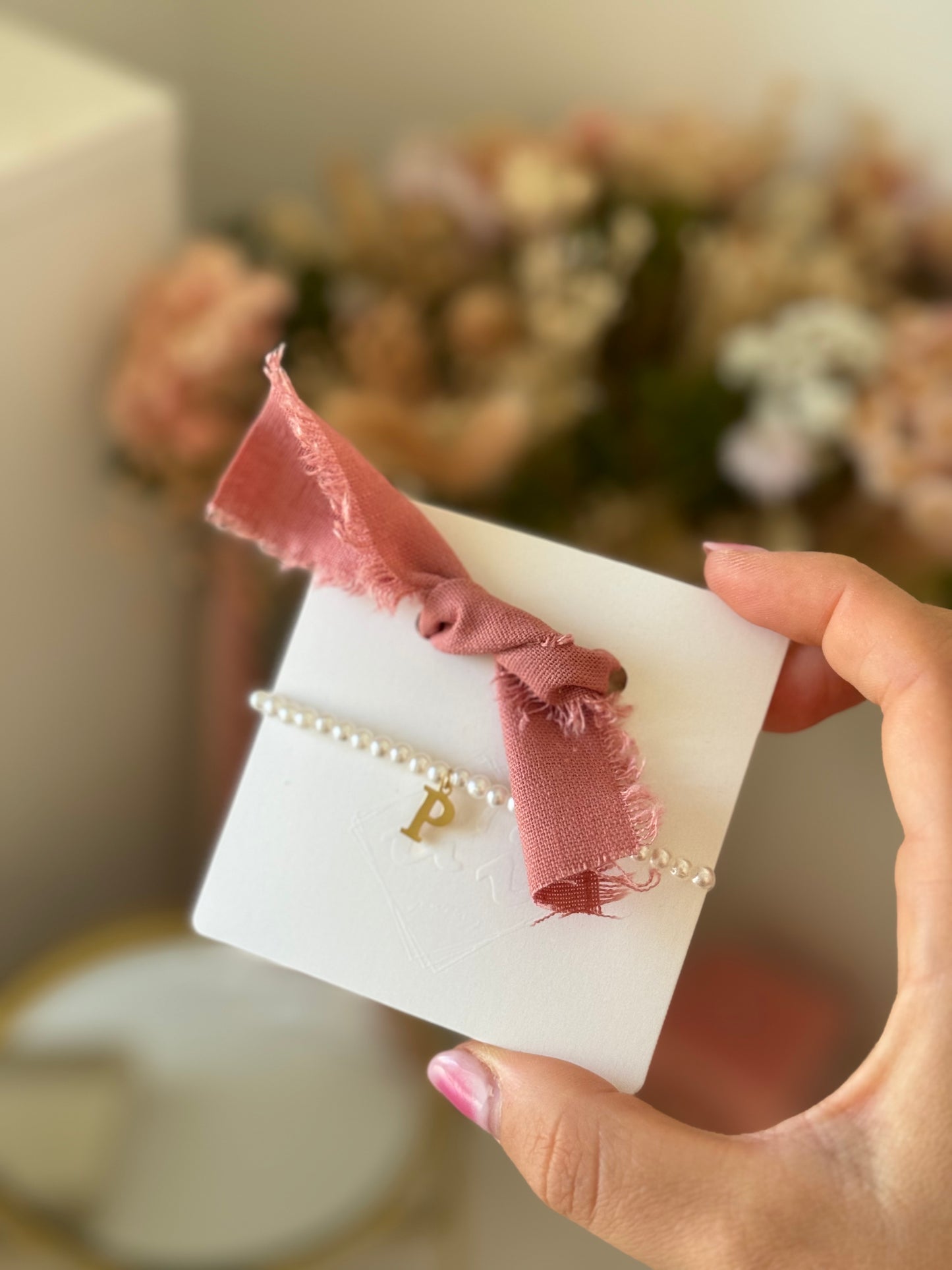 Pulsera clásica lazada rosa maquillaje