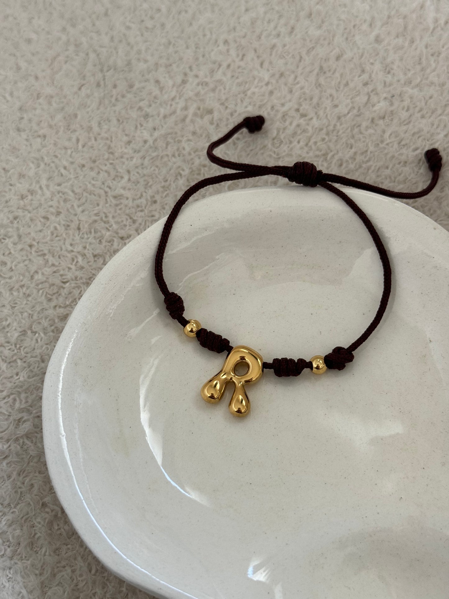 Pulsera inicial globo